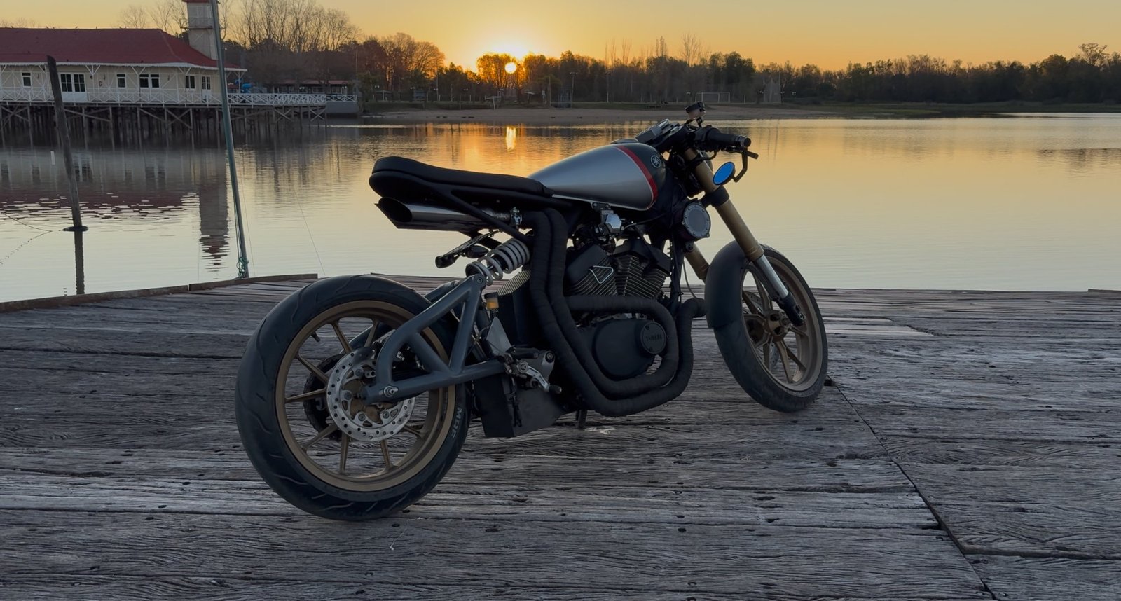 Finished Virago cafe racer, front three-quarter at golden hour